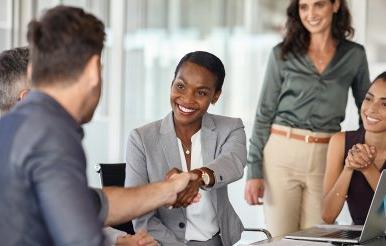 Business woman shaking hands