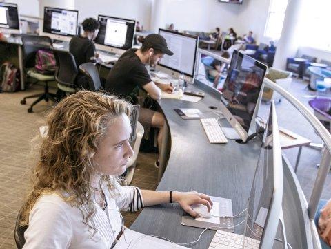 Student in Perry Library